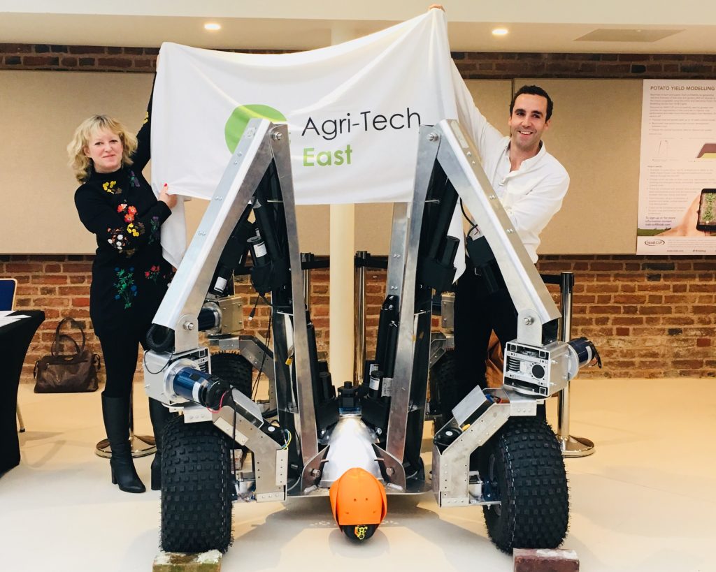 Belinda Clarke of Agri-Tech East and Sam Watson Jones from Small Robot Company reveal Harry at REAP 2018